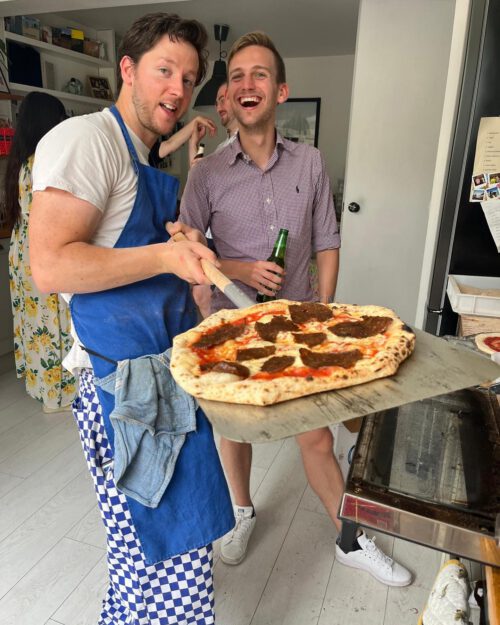 pizza coming out of the oven